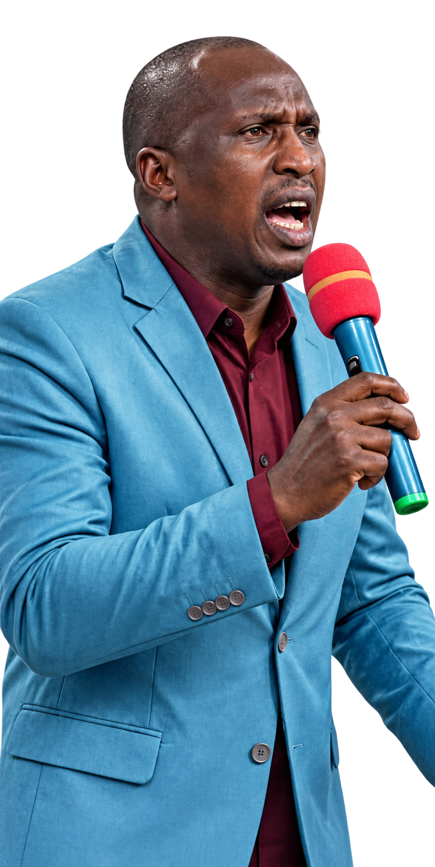 Pastor Danial Mugeni preaching while holding a microphone